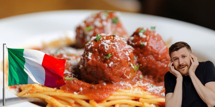 Italian food myths. A plate of spaghetti and meatballs and someone looking horrified
