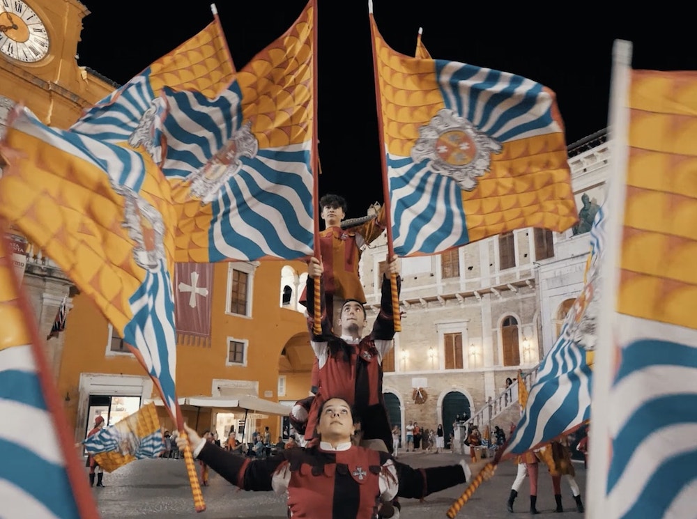 Flag wavers in Piazza del Popolo, Fermo