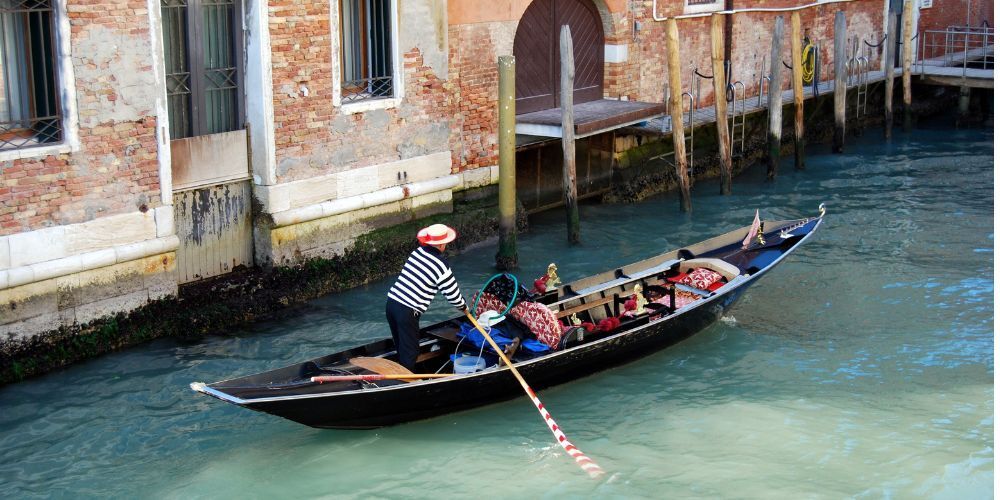 The venetian oar in action on a gondola, Venice The venetian oar in action on a gondola, Venice
