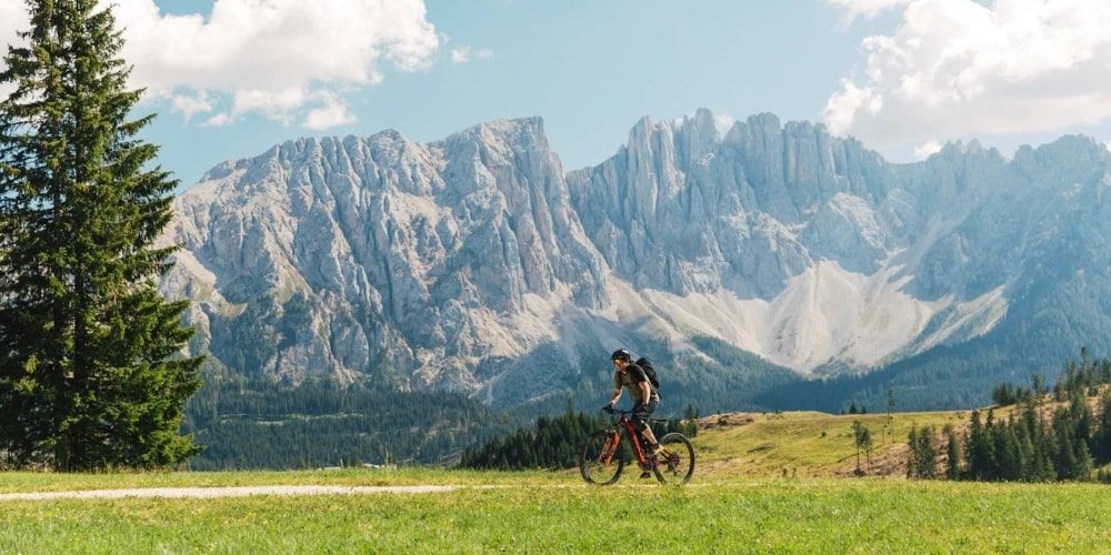 Mountain bike trails at Carezza Dolomites surrounded by nature Mountain bike trails at Carezza Dolomites surrounded by nature