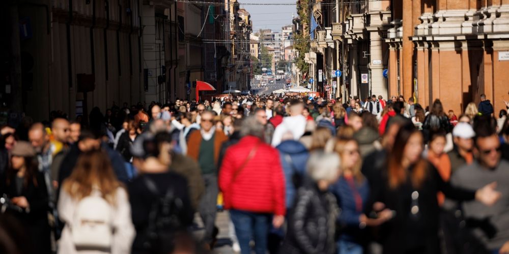 Crowded-street-in-Bologna-Italy Crowded-street-in-Bologna-Italy